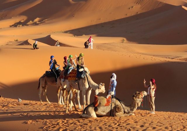 Camel Ride into the Dunes