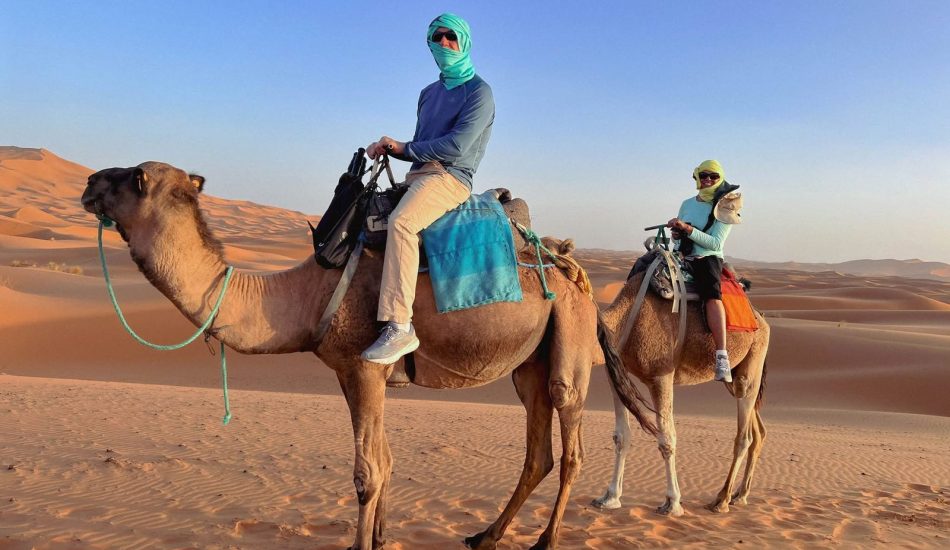 Ride the rhythm of the dunes — camel trekking into the heart of the Sahara.