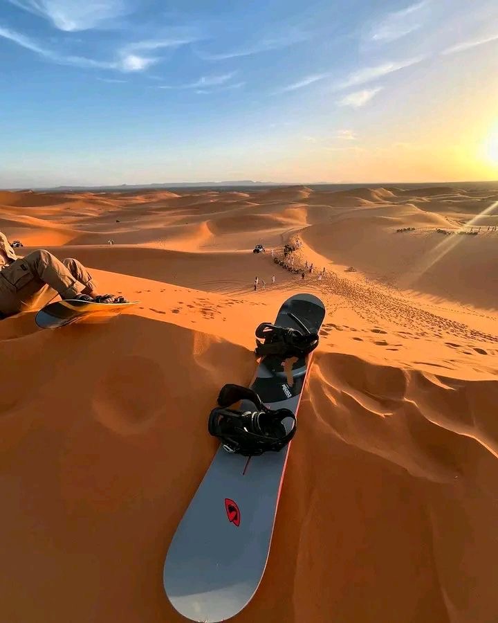 Sandboarding in Merzouga dunes