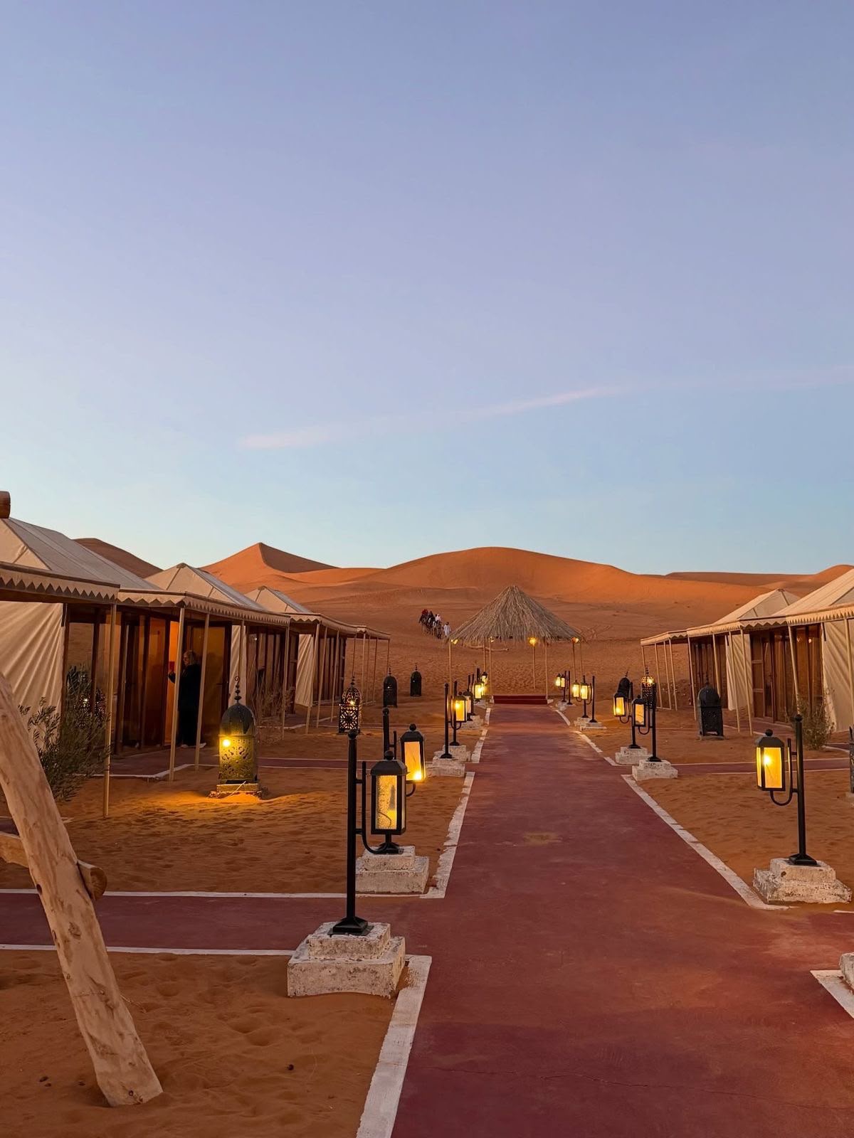 Sunset over a desert camp in the Erg Chigaga Sahara