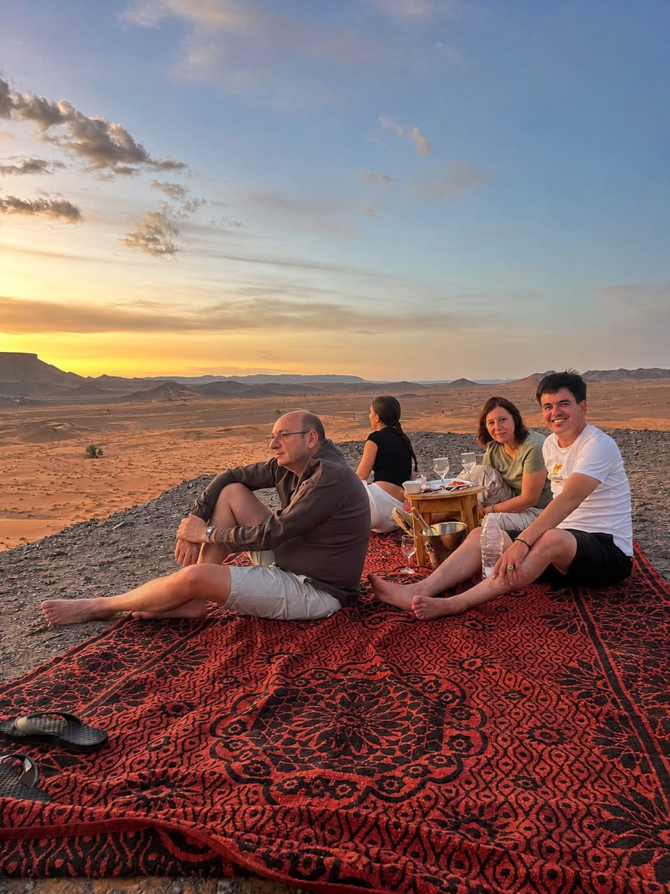 Tramonto sulle dune di Erg Chebbi durante il trekking in cammello a Merzouga