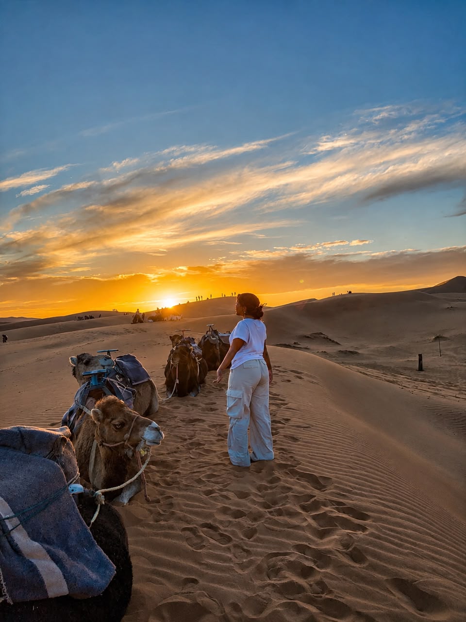 Passeggiata in cammello al tramonto nel deserto di Merzouga